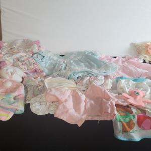 Photo of NICE SELECTION OF DOLL CLOTHES