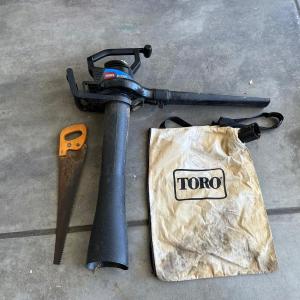 Photo of TORO LEAF BLOWER AND VACUUM PLUS A HAND SAW