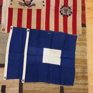 Photo of COAST GUARD ENSIGS NO 5 CLOTH FLAG AND NAVAL SIGNAL FLAG