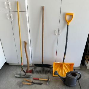 Photo of YARD TOOLS AND A WATERING CAN