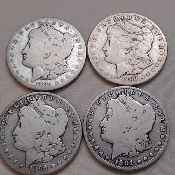 Photo of Set of Four U. S. Mint Morgan Silver Dollars (#168) Various Worn Condition Legib
