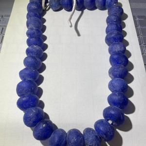 Photo of Vintage 29" African Krobo Recycled Glass Blue Donut Beads 1" Wide on a Leather C