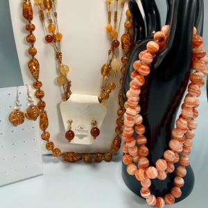 Photo of LOT:44: Amber Colored Necklaces and Earrings and Coral Colored Beaded Necklace.