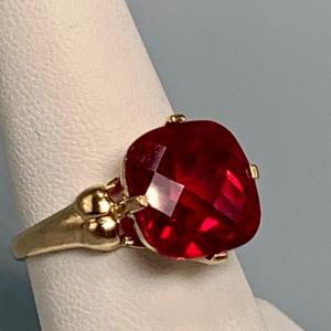 Photo of LOT:46: 10K Gold Cushon Cut Ruby Glass Cocktail Ring Size 8 - 4gtw
