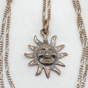 Photo of LOT 101: Sterling Sun Pendant Necklace - 30"