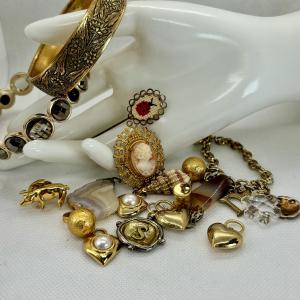 Photo of LOT 112: Gold Tone Collection: Charms, Hearts, Seashells & More along w/Gold ton