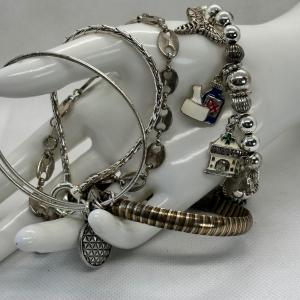 Photo of LOT 109: Silver Tone Charm Bracelet & More