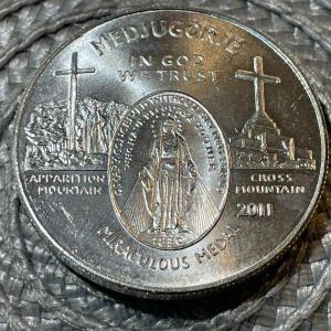 Photo of 2011 MIRACULOUS MEDAL .999 FINE SILVER 1-OUNCE ROUND IN UNCIRCULATED CONDITION (