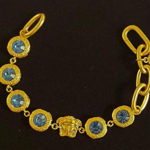 Photo of Beautiful Versace gold colored Bracelet