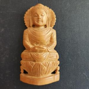 Photo of Wood Buddha Statuette