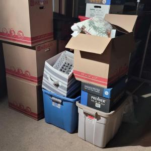 Photo of yard sale boxed left overs-bid