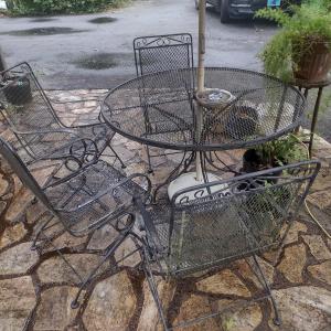 Photo of Wrought Metal Five Piece Patio Set with Spring Rocker Style Chairs includes Umbr