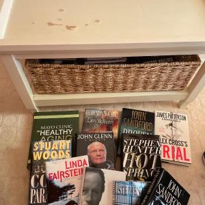 Photo of Side table with hardcover books