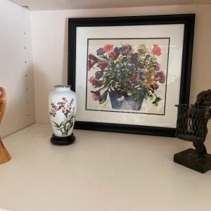 Photo of Nagle signed artwork with wood family and vase