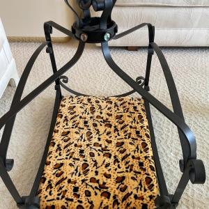 Photo of Small dog bed with black metal decor