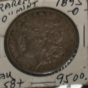 Photo of 1895 O MORGAN AU 58 + U S COIN 1$ rarest of dates
