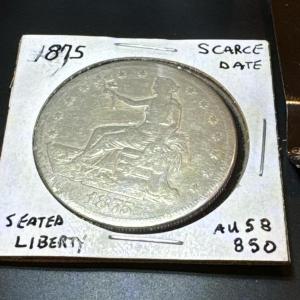 Photo of 1875 SEATED LIBERTY 1$ U.S. coin Scarce Date Au 58