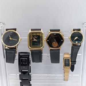 Photo of LOT 318: Collection of Black and Gold-Tone Watches- Movado, Caravelle & More